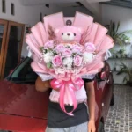 buket bunga mawar pink 7 tangkai boneka teddy bear pink besar purwokerto