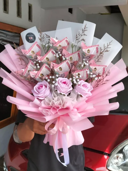buket uang 100rb isi 10 lembar dengan nominal 1jt rupiah untuk anniversary atau ulang tahun bisa kirim area Purwokerto
